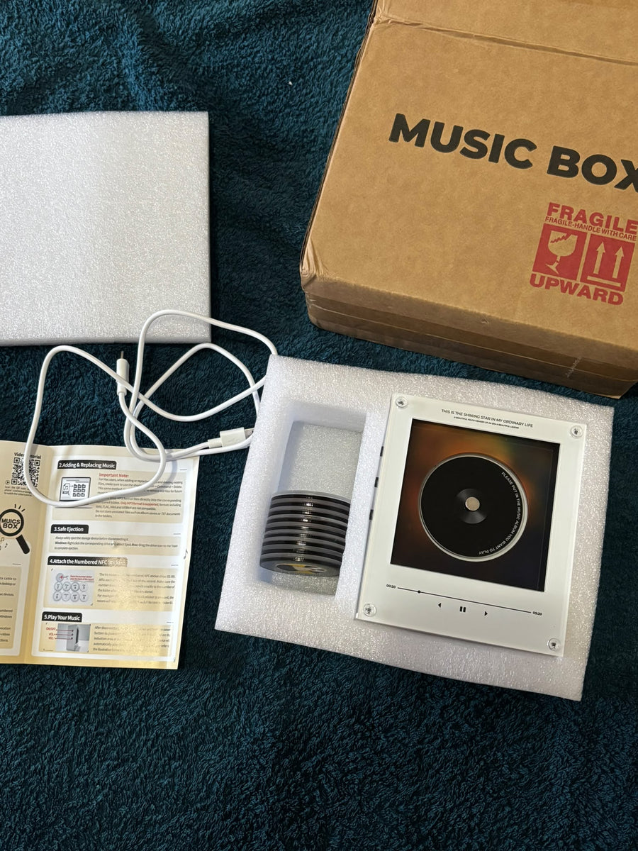 Contenido completo de Nami Loop con discos, cable y manual